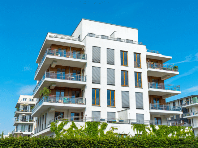 How Can Apartment Building Loans Help Investors Scale a Non-owner-occupied Multifamily Portfolio?